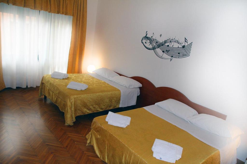 Chambre Quadruple avec Salle de Bains Commune